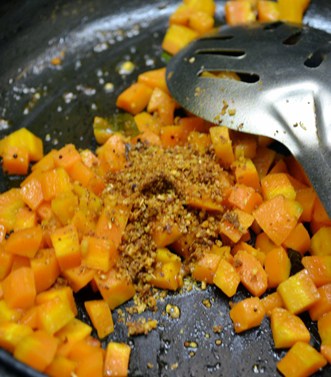 Adding spice powder for carrot curry recipe, carrot stir fry recipe