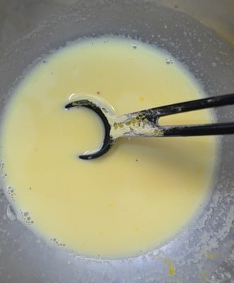 Making custard for fruit custard recipe