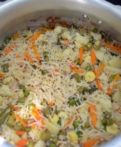 making vegetabe pulao in pressure cooker 