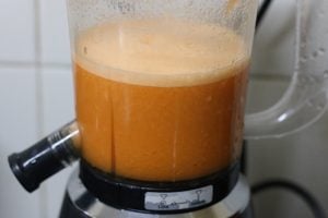 making carrot juice in a blender