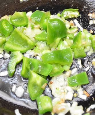 Sauteing capsicum for chilli baby corn recipe