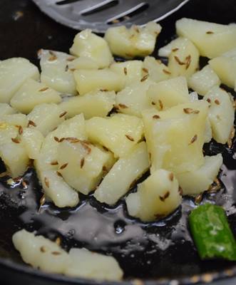 Add boiled potatoes