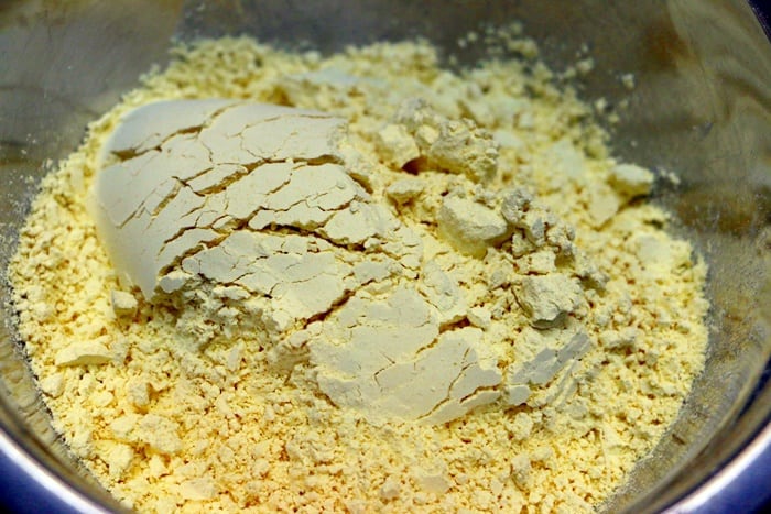 Sieved chickpea four or besan in a mixing bowl