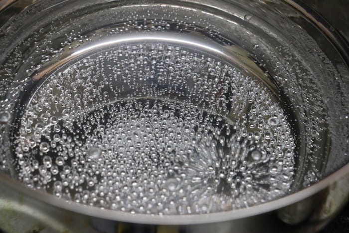 boiling water in a steamer pot