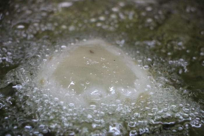 frying the shaped samosa