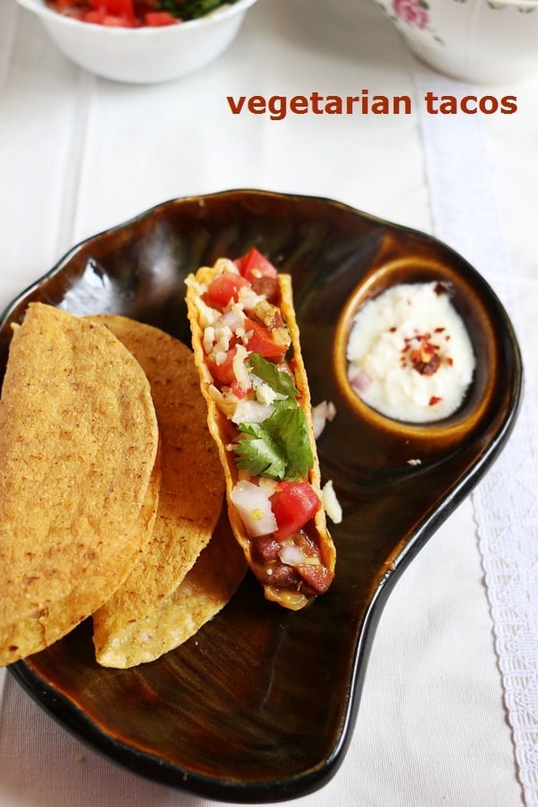 Easy homemade vegetarian tacos served with a cream dip.