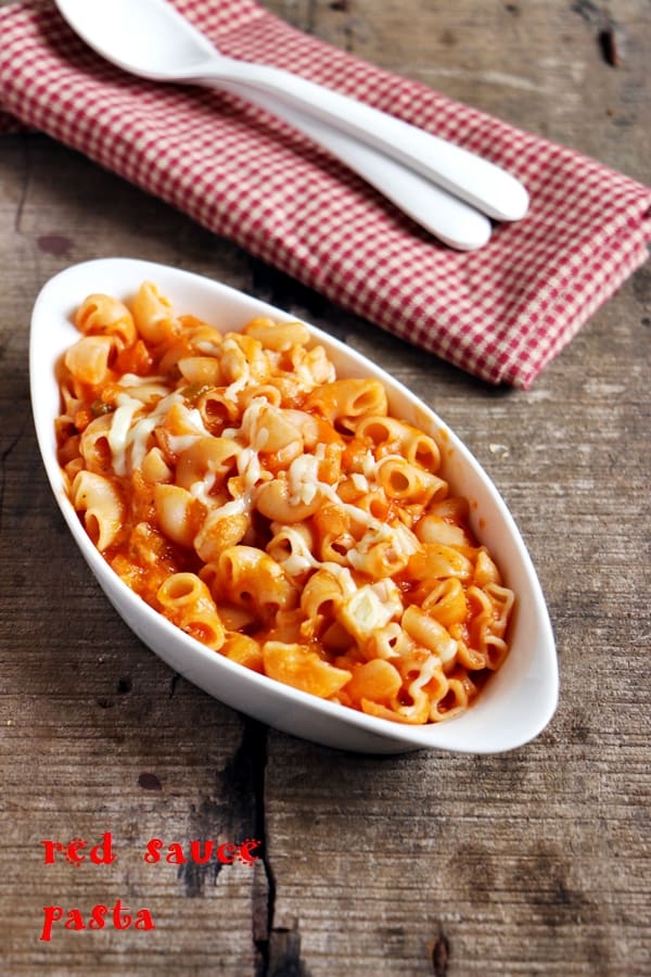 Red sauce pasta served in a white bowl for dinner