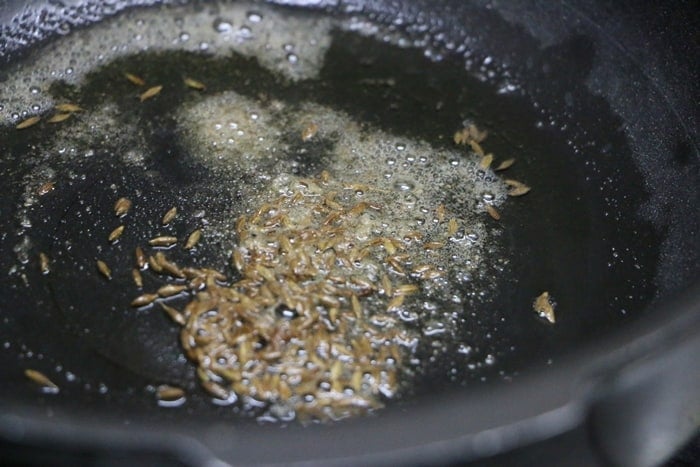 frying cumin seeds in oil