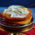 Malpua rabdi recipe is a traditional Indian sweet which is basically a deep fried crepe or pancake dunked in sugar syrup and further served with rabdi (sweet thickened milk)