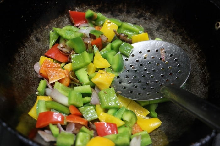 sauteing bell peppers for making aloo capsicum recipe