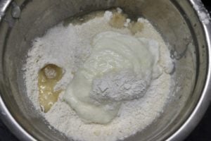 ingredients for bhature in a mixing bowl