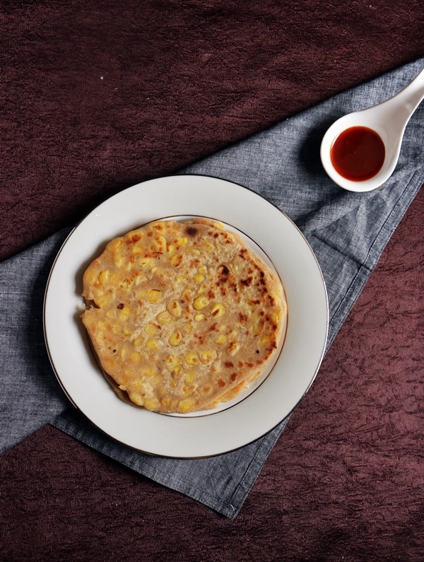 overhead shot- cheese paratha with corn