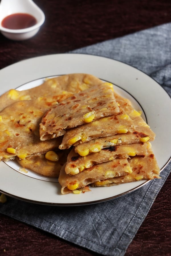 cheese paratha sliced into wedges