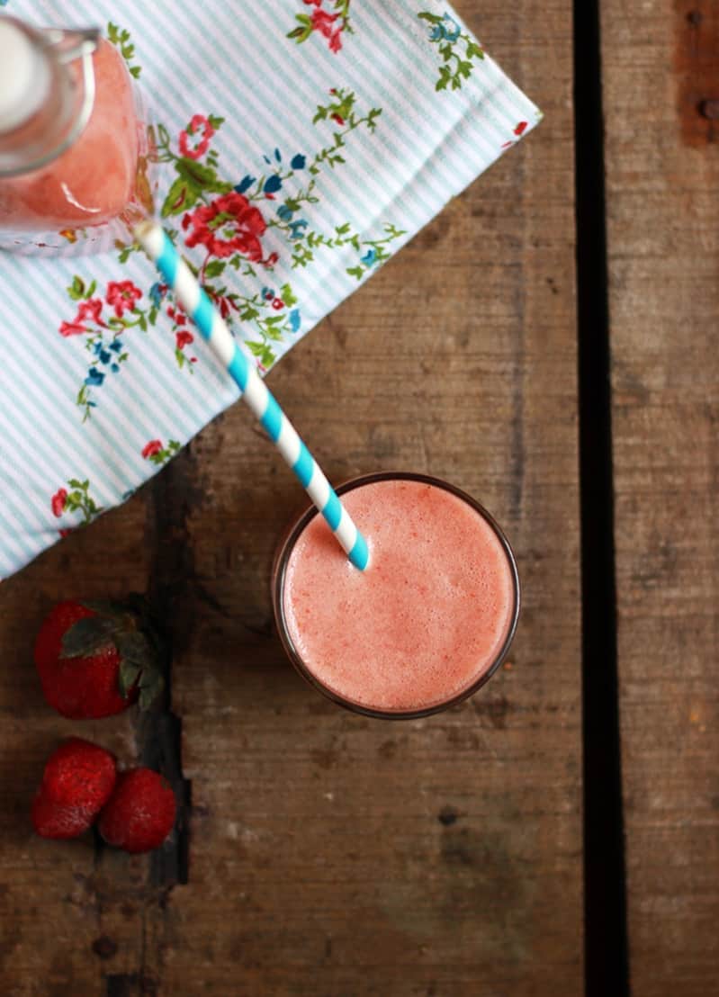 easy strawberry smoothie with apple served for breakfast.