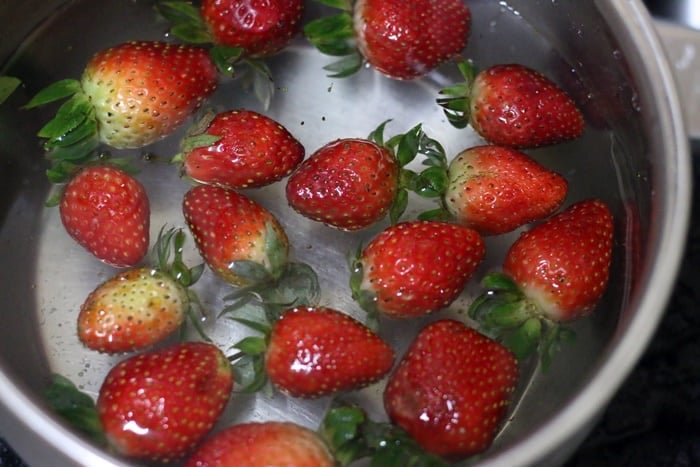 fresh strawberries soaked in water