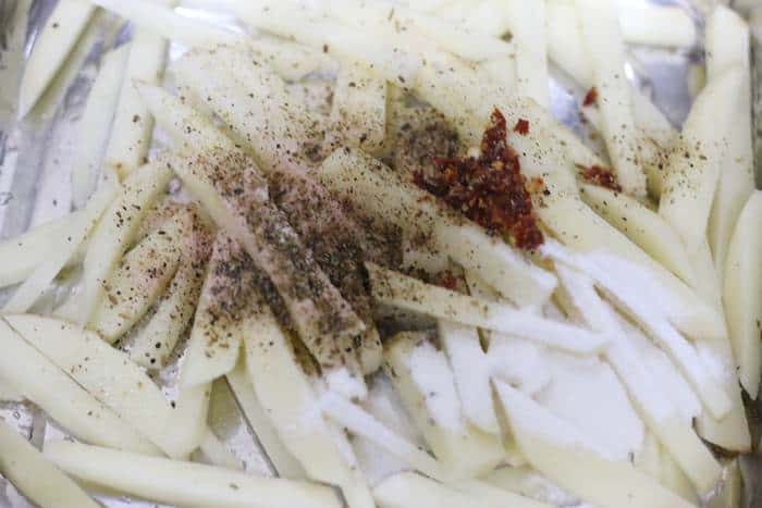 red chili paste, corn flour, salt added to potato fingers