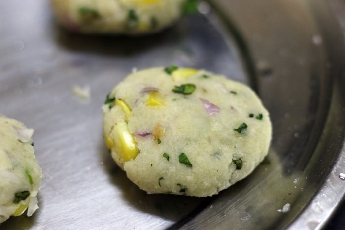 shaped batata vada ready to be fried