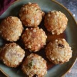 Sabudana vada is a popular deep fried snack from Maharastra. This vegan gluten free cutlet made of sago or tapioca pearls is popular snack for fasting days like Navratri. You can make these vadas in no time if you have soaked sago pearls ready. With just very few ingredients like potatoes, peanuts and sago this vada tastes so delicious and filling. Here is how to make best sabudana vada at home that does not break, is crispy and non greasy!