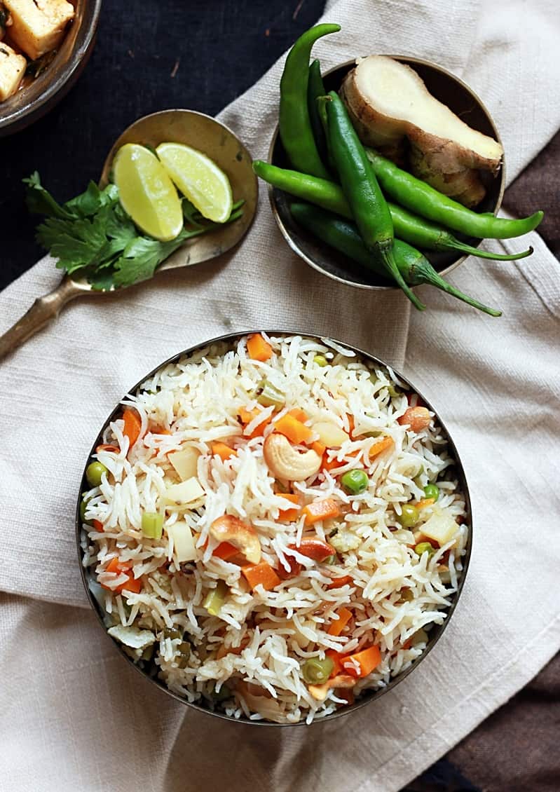 Overhead shot of delicious veg pulao served in a copper bowl