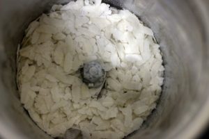 poha or flattened rice in a grinder jar