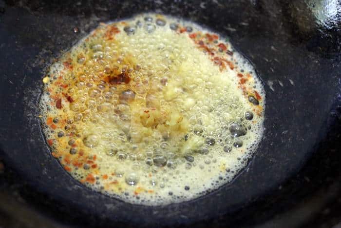 sauteing ginger garlic, chili in oil