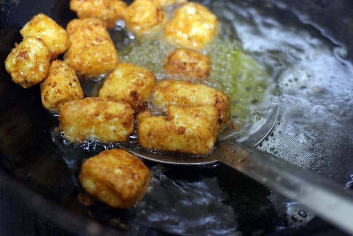 frying paneer in hot oil