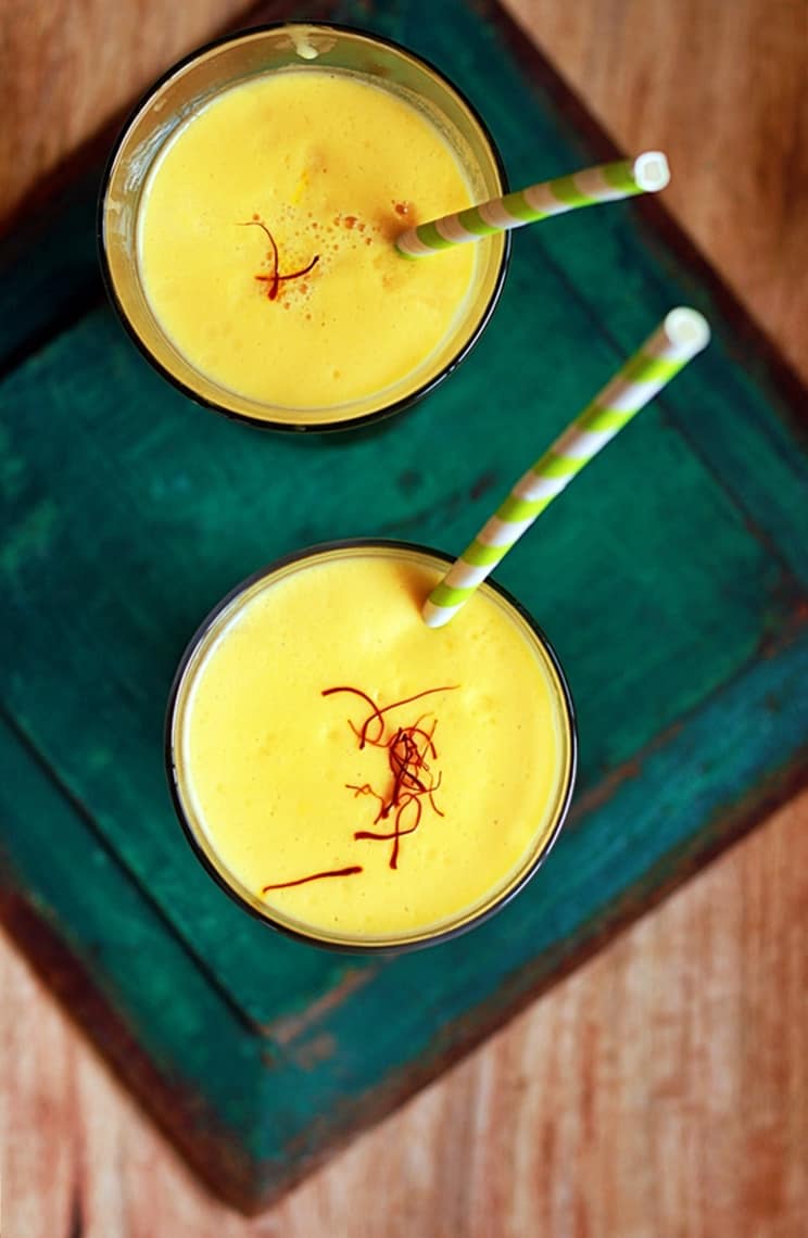 overhead shot of creamy homemade mango lassi