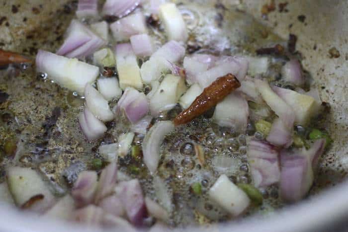 sauteing whole spices and onions in oil