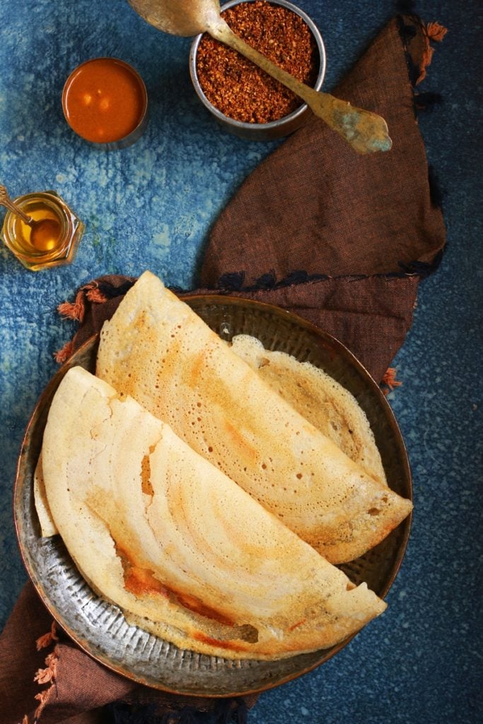 crispy dosa served with chutney, sambar and podi