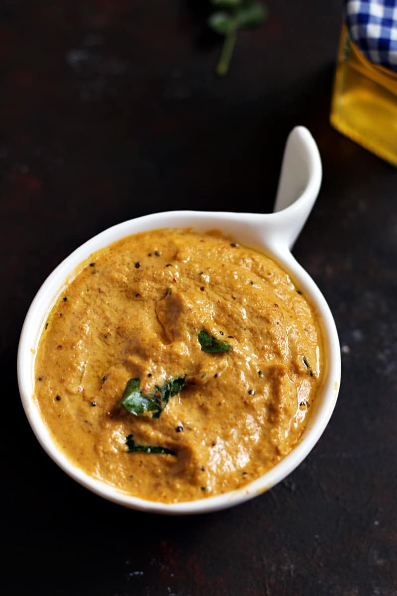 Closeup shot of badam chutney served in a small bowl