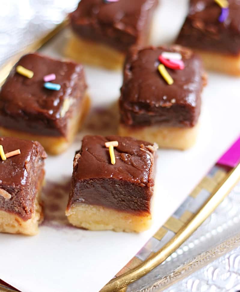 Homemade two layered chocolate burfi served on a decorative plate