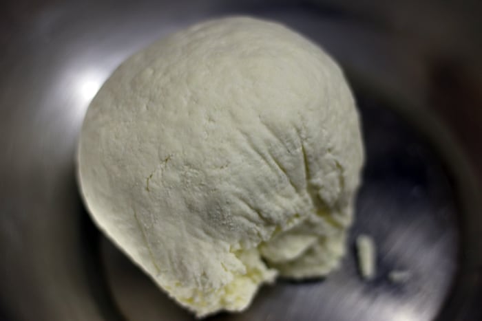 chenna or milk solid collected in a plate after separating whey water