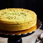 easy eggless parsi mawa cake served in a cake board