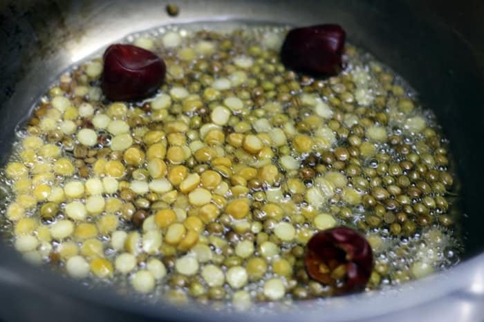 preparing fresh spice powder for hotel sambar recipe