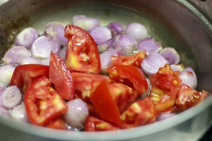 Sauteing onion and tomatoes for hotel sambar recipe