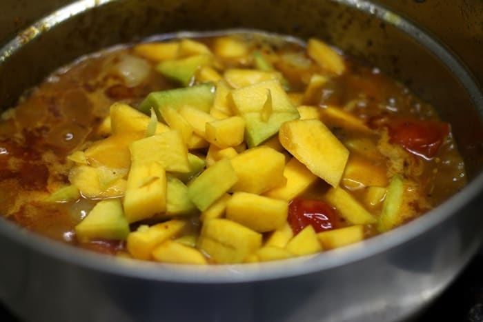 Making hotel sambar- adding dal and pumpkin pieces