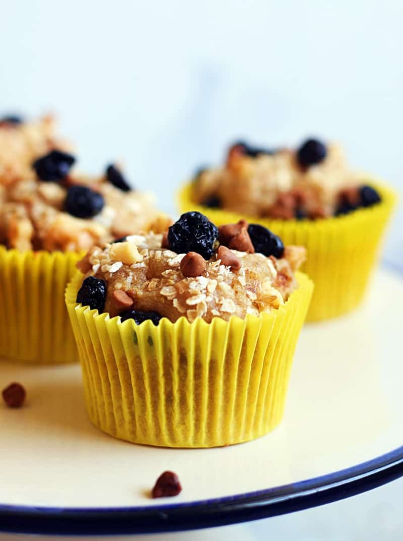 vegan banana muffins recipe- vegan muffin topped with dried berries and oats.