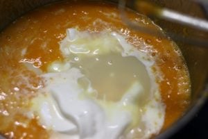 ingredients for mango kulfi in a blender jar