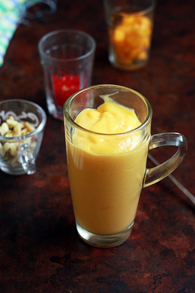 Making Mango Mastani Recipe- Thick mango shake and toppings