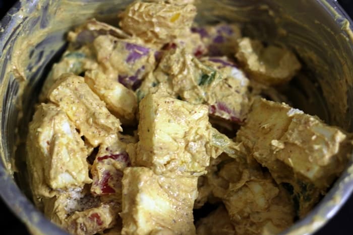 paneer cubes marinating in spiced curd