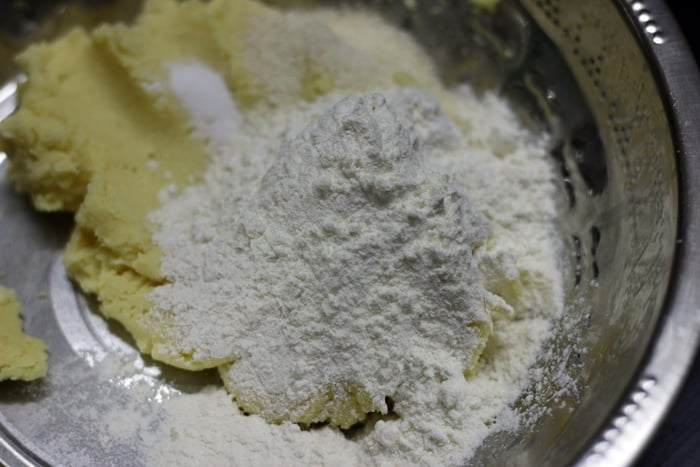 all purpose flour, baking soda added to crumbled khoya