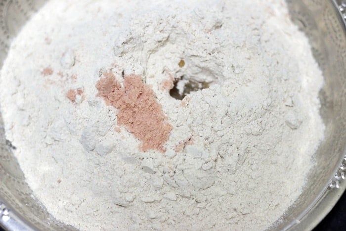 Flour, salt, oil in a bowl for making paratha dough