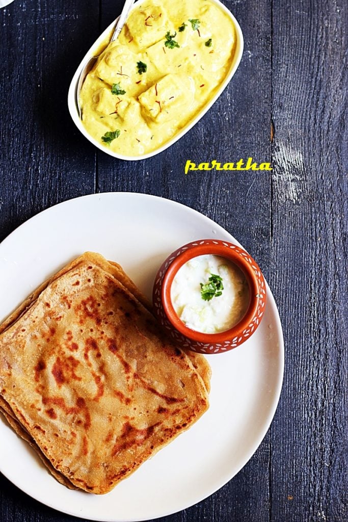 overhead shot of plain paratha in ceramic plate