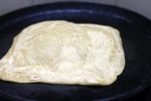 cooking plain paratha