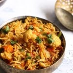 homemade tava pulao served in a brass pan