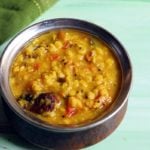 Chana dal served in a copper pan