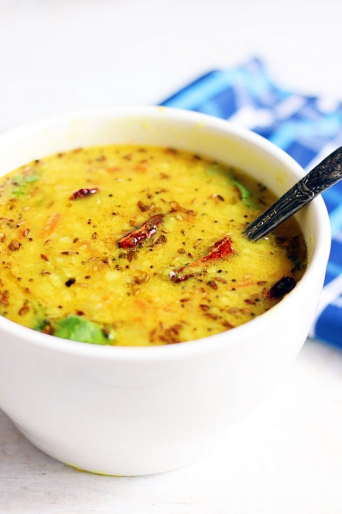 dal tadka in a white ceramic bowl