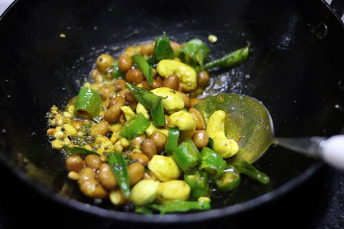 lemon rice added to tempering ingredients for lemon rice