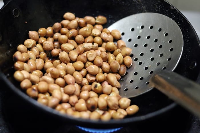 roasting peanuts for making chutney