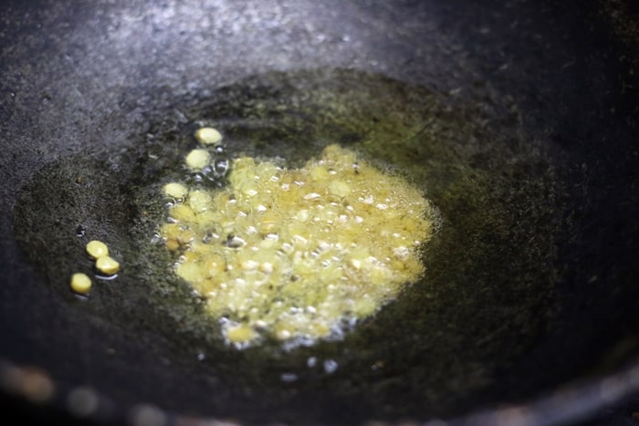 frying mustard seeds, urad dal in oil